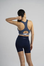 Load image into Gallery viewer, New Balance Womens Seamless Wirefree, Racerback Sports Bra with Removable Pads, Bottom Band with Logo, Camo Vintage Indigo