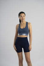 Load image into Gallery viewer, New Balance Womens Seamless Wirefree, Racerback Sports Bra with Removable Pads, Bottom Band with Logo, Camo Black