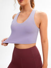 Load image into Gallery viewer, JOYSPELS Sports Bras for Women Extra Comfort Criss-Cross Back Padded Workout Tops for Women Medium Support Light Purple