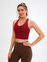 Load image into Gallery viewer, JOYSPELS Sports Bras for Women Extra Comfort Criss-Cross Back Padded Workout Tops for Women Medium Support