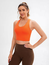 Load image into Gallery viewer, JOYSPELS Sports Bras for Women Extra Comfort Criss-Cross Back Padded Workout Tops for Women Medium Support