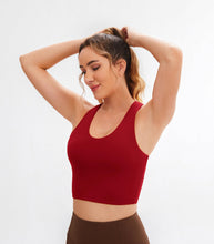 Load image into Gallery viewer, JOYSPELS Sports Bras for Women Extra Comfort Criss-Cross Back Padded Workout Tops for Women Medium Support