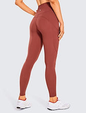 Load image into Gallery viewer, CRZ YOGA Women's Naked Feeling Workout Leggings 25 Inches - High Waisted Yoga Pants with Side Pockets The Cognac Brown