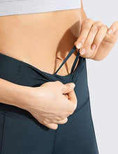 Load image into Gallery viewer, CRZ YOGA Women's Naked Feeling Workout Leggings 25 Inches - High Waisted Yoga Pants with Side Pockets Dark Green