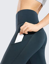 Load image into Gallery viewer, CRZ YOGA Women's Naked Feeling Workout Leggings 25 Inches - High Waisted Yoga Pants with Side Pockets Dark Green
