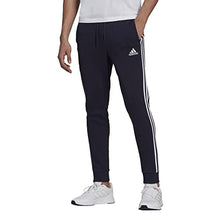 Load image into Gallery viewer, adidas Men&#39;s Standard Essentials Fleece Tapered Cuff 3-Stripes Pants, Legend Ink/White, XX-Small

