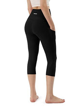 Load image into Gallery viewer, ODODOS Women&#39;s High Waisted Yoga Capris with Pockets,Tummy Control Non See Through Workout Sports Running Capri Leggings, Black
