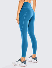 Load image into Gallery viewer, CRZ YOGA Women&#39;s Naked Feeling Workout Leggings 25 Inches - High Waisted Yoga Pants with Side Pockets Carbon blue
